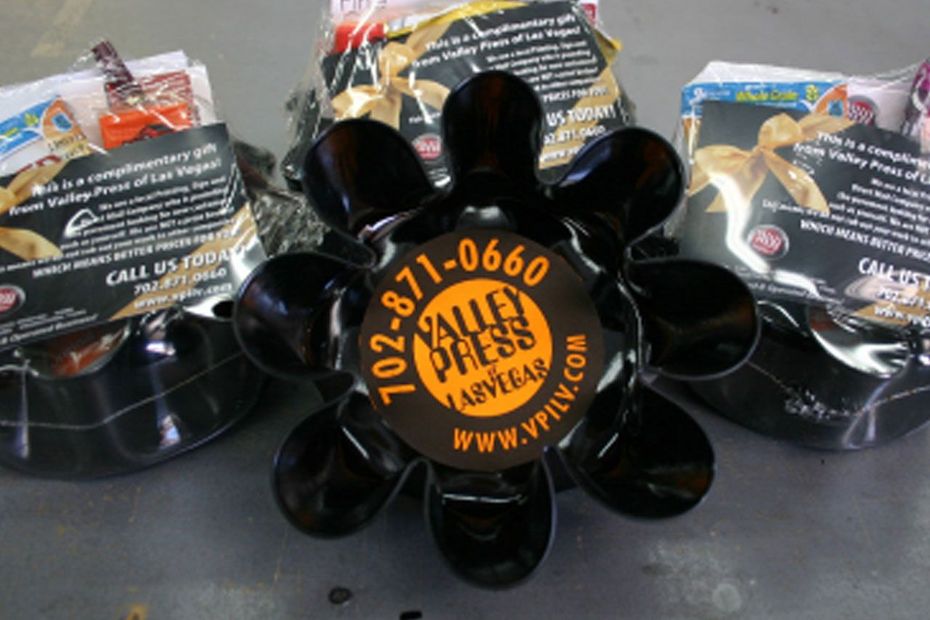 The Valley Press Bowl, a recycled 12-inch vinyl record melted into a bowl, stamped with the round Valley Press logo and filled with marketing samples